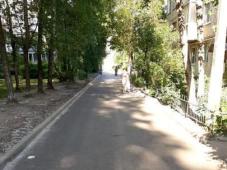 8 октября 2021 г. Великий Новгород, местный проезд 1 в мкр.6 Западного р-на, просп. Мира 27-29. Дорожный ремонт по региональной программе "Дорога к дому". Фото предоставлено комитетом по управлению городским хозяйством